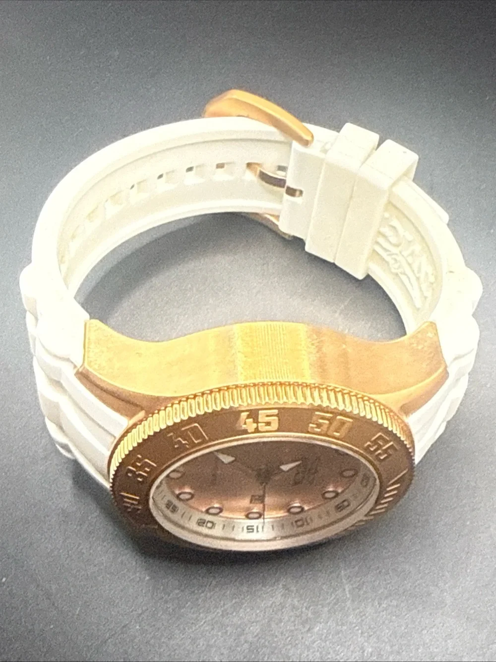 Invicta Gold Bezel Rose Gold Dial White Strap Watch